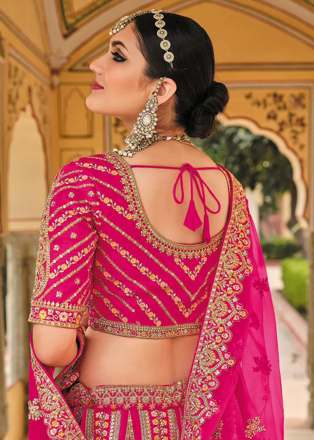 Enticing Pink Bridal Wear Heavy Embroidered Silk Lehenga Choli